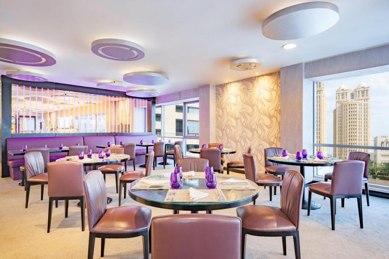 Qabila Westbay Hotel By Marriott Doha Exterior foto The interior of the restaurant